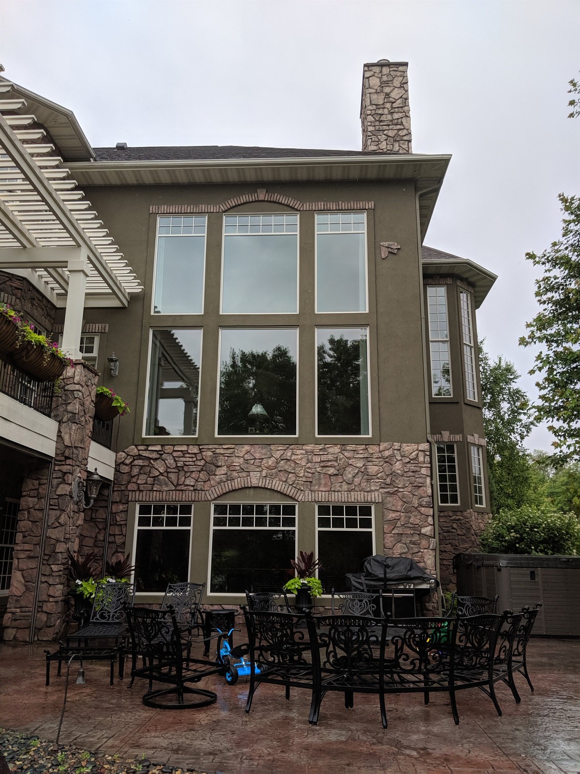 Window cleaning technician completing exterior glass
