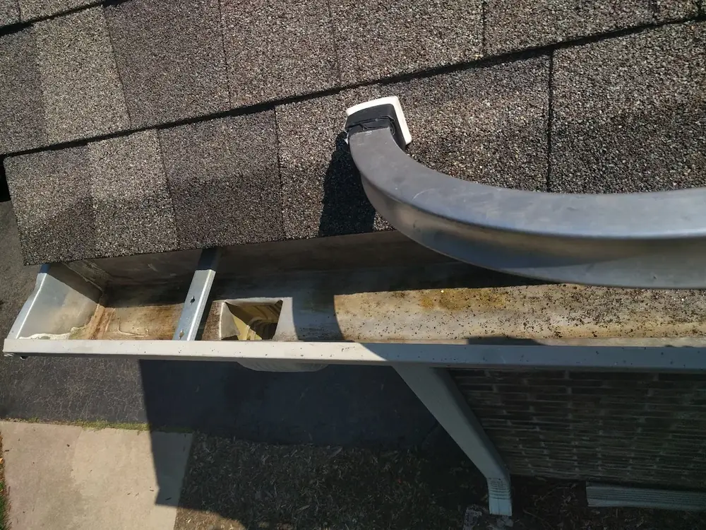 Repaired and cleaned gutters after service