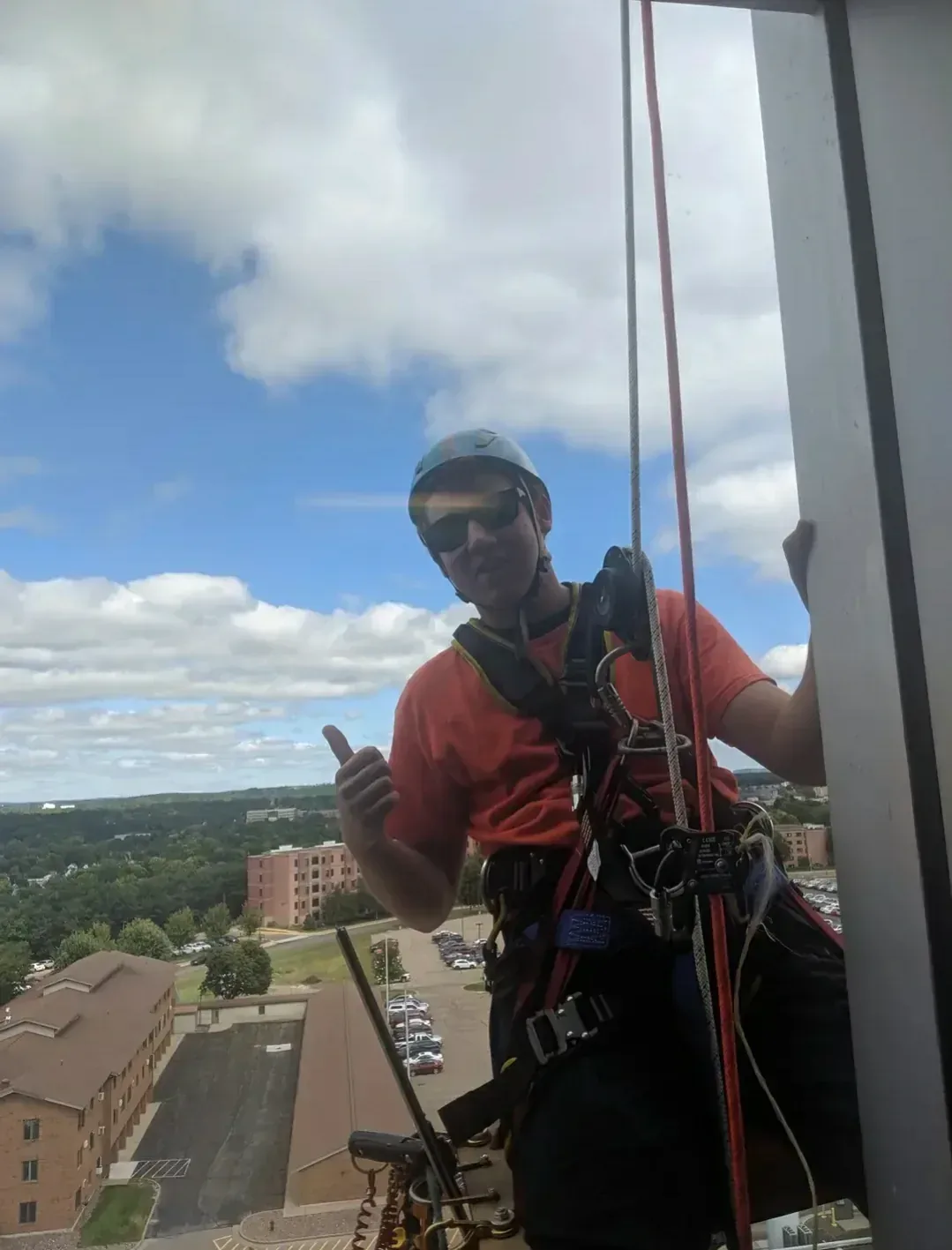 High-rise rope access window cleaning on a commercial building