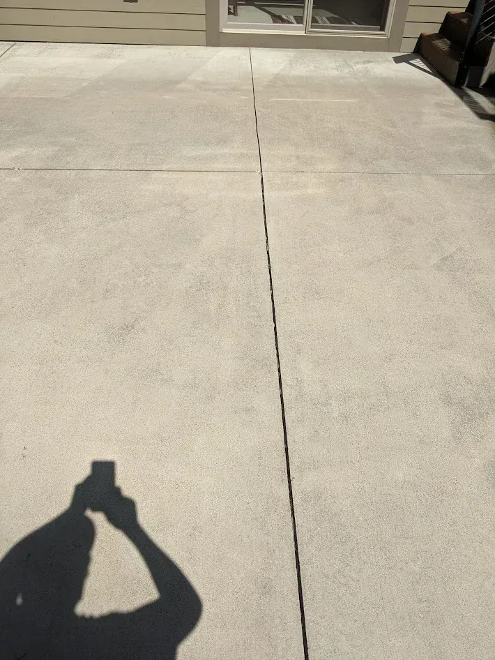 After pressure washing showing a cleaned exterior surface